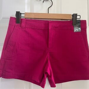 Fushia shorts with 4” inseam. Size 4 NWT